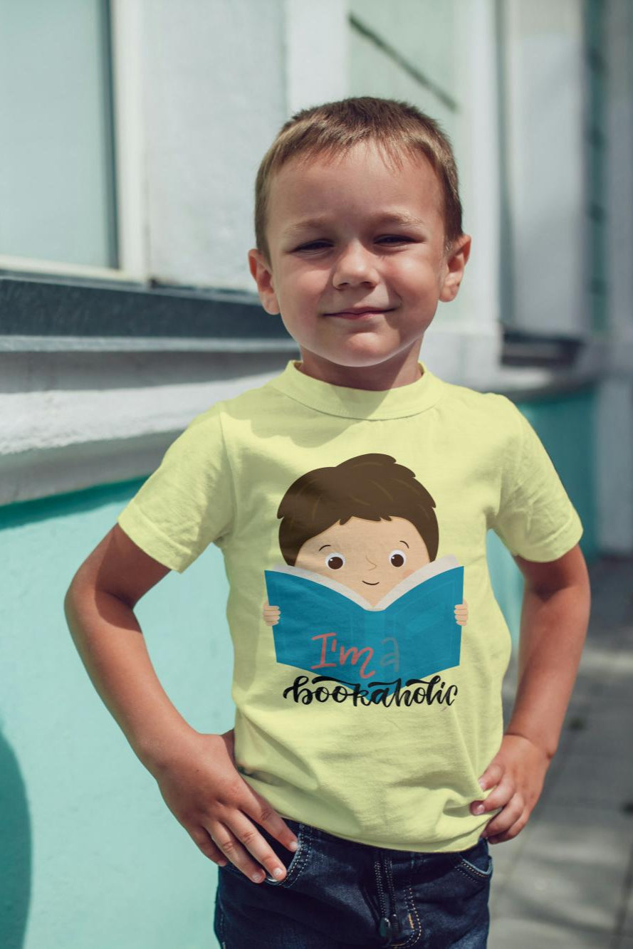 Kid's Bookaholic Unisex T-shirt Butter Yellow by ZealforTee