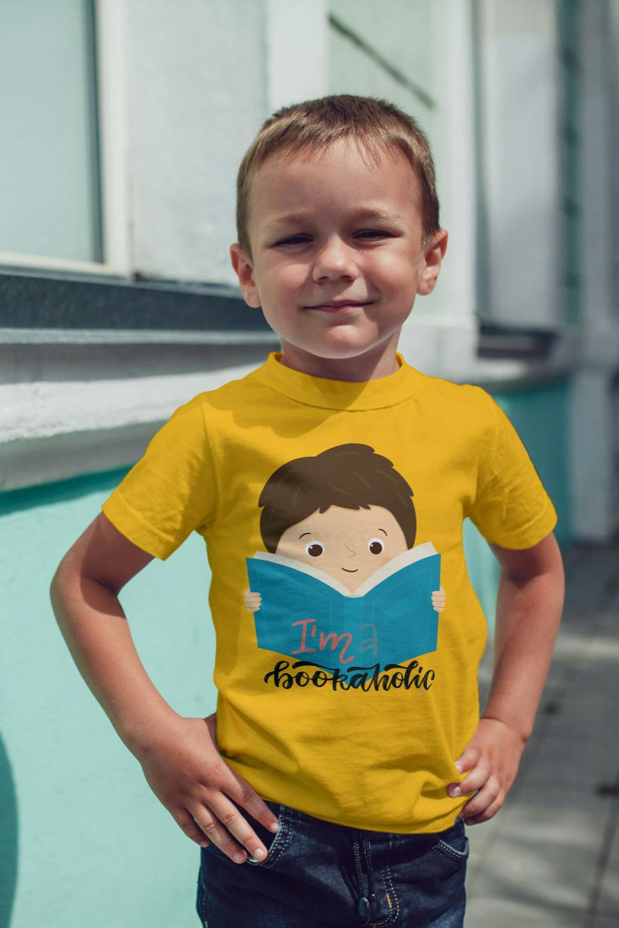 Kid's Bookaholic Unisex T-shirt Butter Yellow by ZealforTee