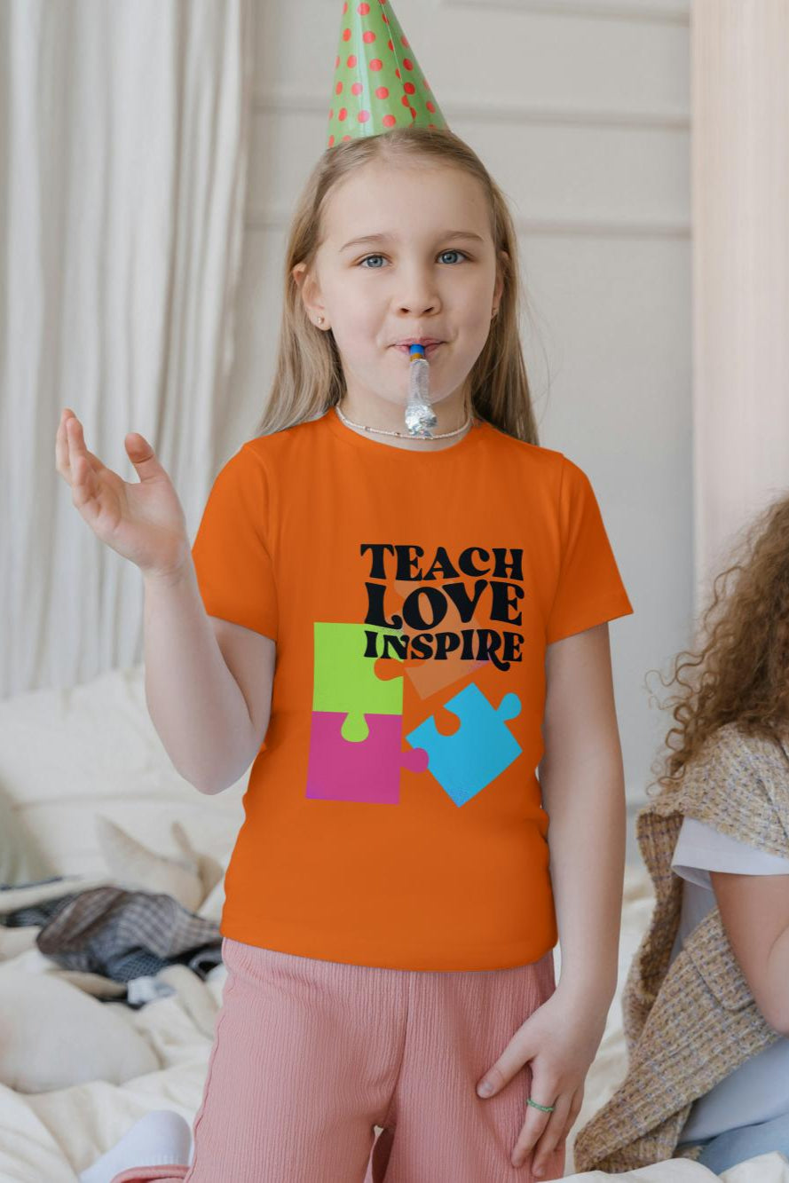 Kid's Teach Love Inspire Unisex T-shirt Light Pink by ZealforTee